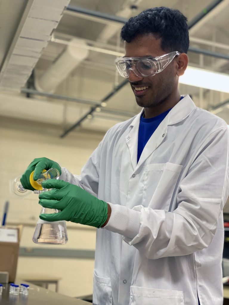 Dhananjay Dileep conducting research in the lab. 