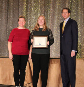 Outstanding Student Chapter award presented to Iowa State. Faculty advisor Stephanie Loveland with chapter member Hailey Bates and AIChE President Billy Bardin
